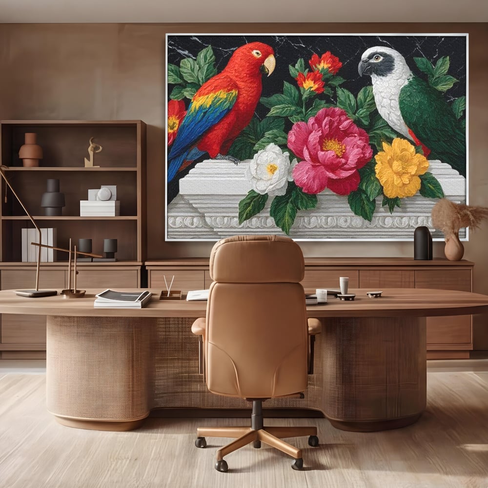 Tablou canvas cu pictura cu papagali si flori, in rama de aluminiu argintiu, pe perete intr-un birou